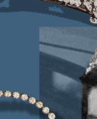 This wonderful tiara does not exist anymore. The tiara was, together with a necklace given 
to HM The Queen by the Nizam of Hyberabad as a coronation-gift. Made by Cartier and later broken 
up to be used in new setting, in the Burmese Ruby Rose Tiara.