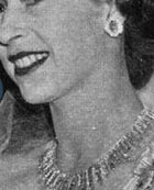 This wonderful tiara does not exist anymore. The tiara was, together with a necklace given 
to HM The Queen by the Nizam of Hyberabad as a coronation-gift. Made by Cartier and later broken 
up to be used in new setting, in the Burmese Ruby Rose Tiara.