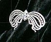 Lacy diamond ribbon bow brooch