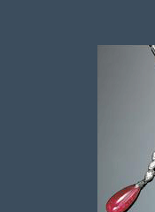 An art deco diamond, ruby and platinum necklace, Lacloche Freres, France 

Estimate: $50000 - $70000 
the neckpiece center designed with hinged, scalloped links, pave-set with transitional brilliant and channel-set baguette-cut diamonds, suspending nine graduating pendants, bead and collet-set with marquise, bullet, baguette, transitional, and single-cut diamonds, terminating with polished ruby briolettes measuring from approximately 25.00 x 13.15 x 9.40mm to 17.80 x 8.30 x 6.00mm; each side anchored by a bezel-set square step-cut diamond weighing approximately 2.00 carats, completed by a flexible, tapering links set with straight baguette, transitional round brilliant, and single-cut diamonds; estimated total diamond weight: 45.00 caratsMaker's mark for Lacloche Freres.